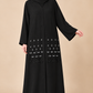 Abaya Bourgeons — Noir — vue portée de face, broderies et manches visibles
