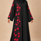 Abaya Coquelicot — Noir & Rouge — vue portée de face, broderies et manches visibles