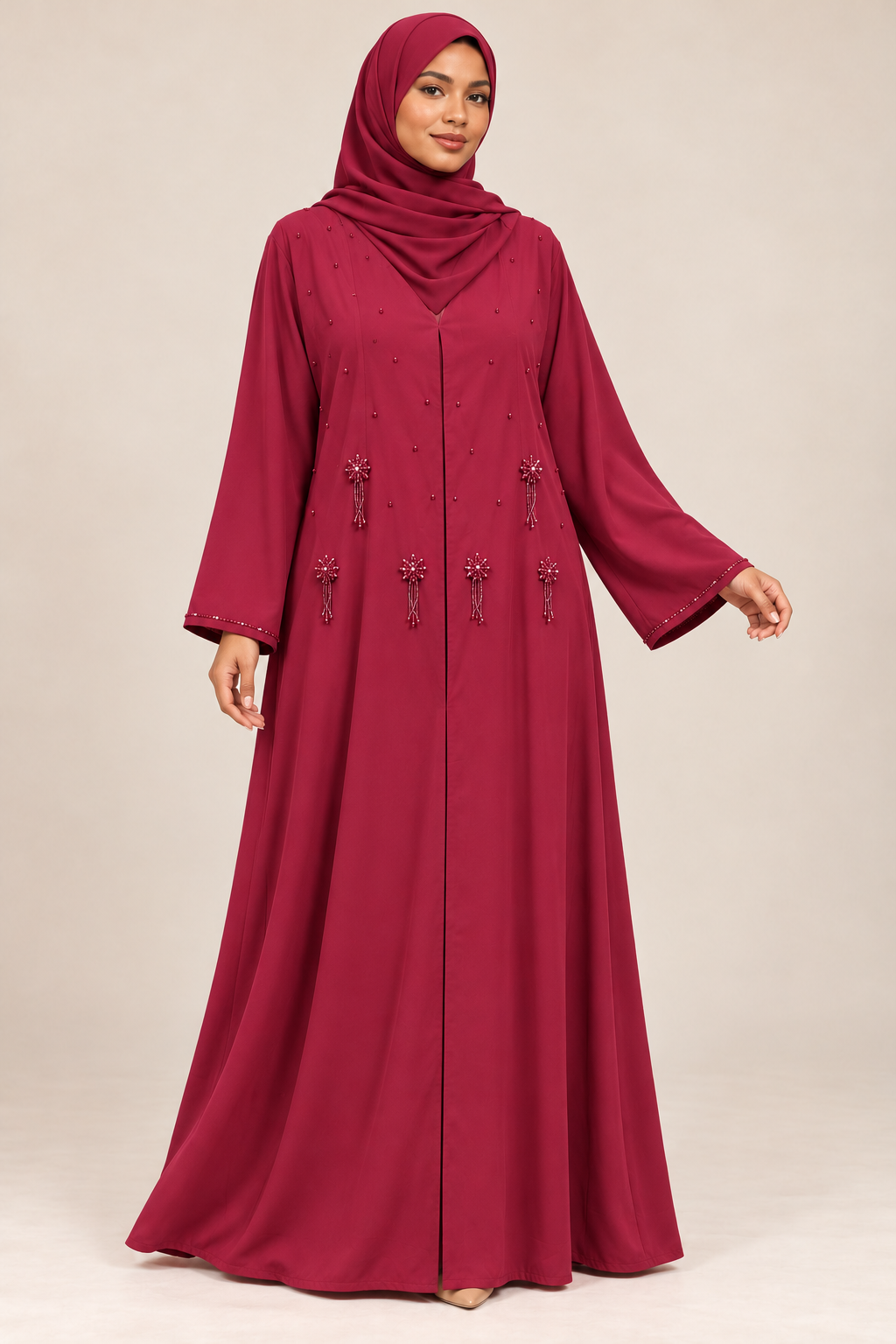 Abaya Soleil bordeaux portée par une mannequin métisse arabe, voile couvrant la poitrine