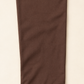 Détail de la manche chocolat, bordure perlée et finition du poignet