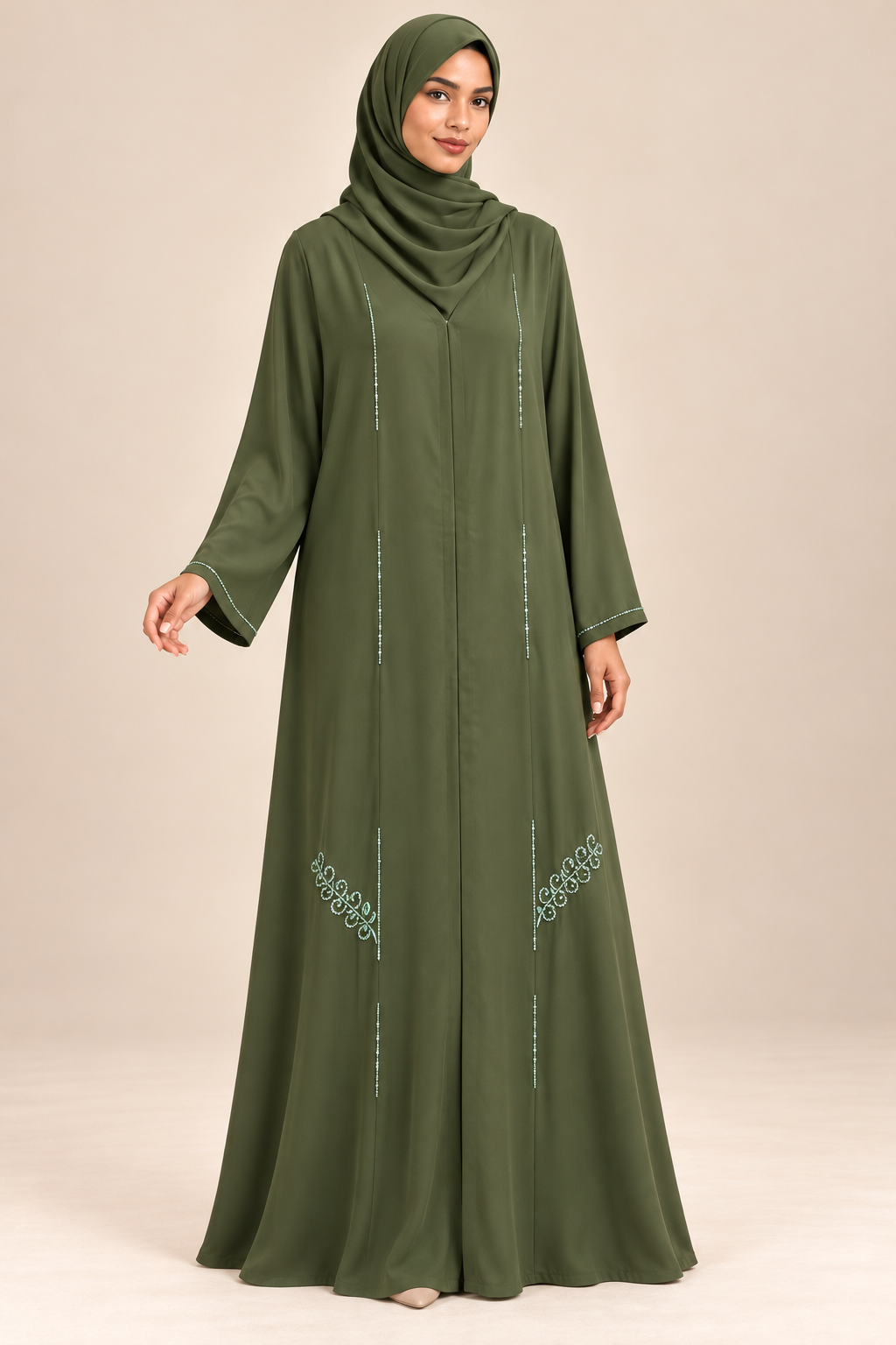 Abaya Volutes vert olive portée de trois quarts, coupe ample et manches longues