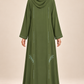 Dos de l’abaya Volutes vert olive, lignes scintillantes et motifs de volutes